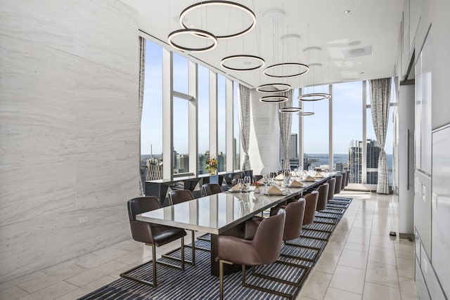 363 E Wacker Dr Unit 2503, Chicago, IL 60601 - dining space with plenty of natural light, floor to ceiling windows, light tile patterned floors, and a chandelier