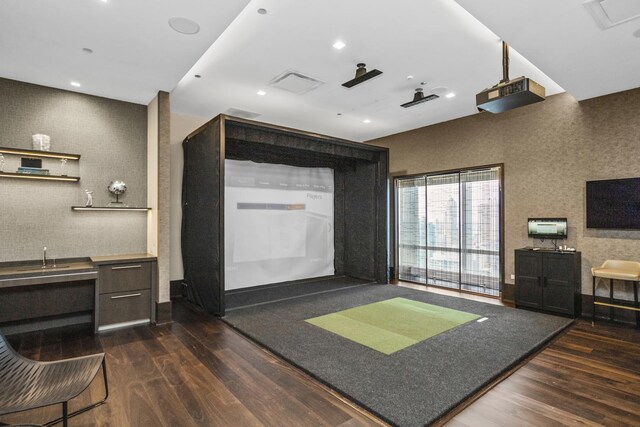363 E Wacker Dr Unit 2503, Chicago, IL 60601 - living room with dark wood-type flooring, golf simulator, and recessed lighting