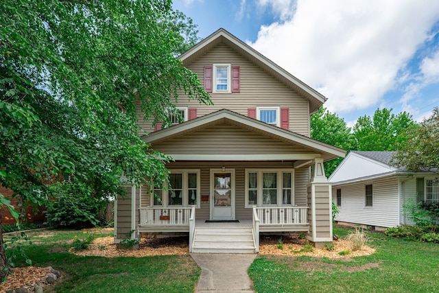 2326 Hancock St, Rockford, IL 61103 - view of front of property with covered porch and a front yard