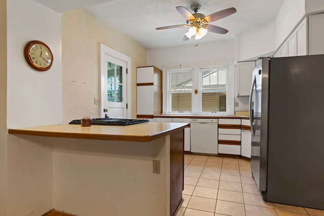 2326 Hancock St, Rockford, IL 61103 - kitchen featuring freestanding refrigerator, dishwasher, cooktop, a peninsula, and white cabinetry