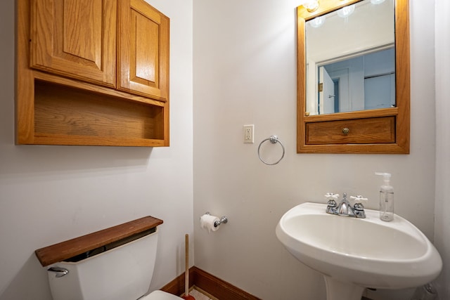 2326 Hancock St, Rockford, IL 61103 - bathroom with toilet and a sink