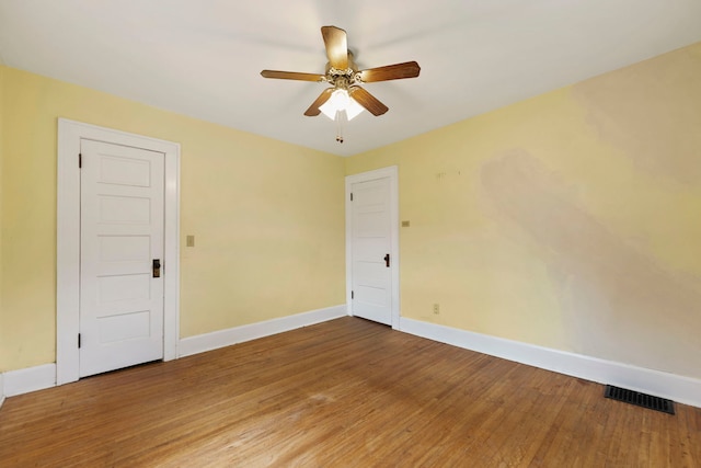2326 Hancock St, Rockford, IL 61103 - empty room featuring ceiling fan and wood finished floors