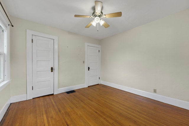 2326 Hancock St, Rockford, IL 61103 - empty room with ceiling fan and wood finished floors