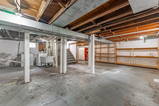 2326 Hancock St, Rockford, IL 61103 - basement with washing machine and clothes dryer and stairs