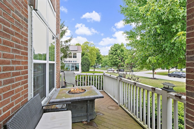 1285 Mallard Ln, Hoffman Estates, IL 60192 - wooden deck with an outdoor fire pit