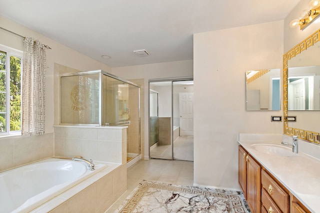 1285 Mallard Ln, Hoffman Estates, IL 60192 - bathroom featuring plenty of natural light, vanity, a bath, and a stall shower