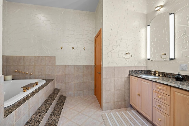 925 E 49th St, Chicago, IL 60615 - full bath with vanity, a garden tub, and tile walls