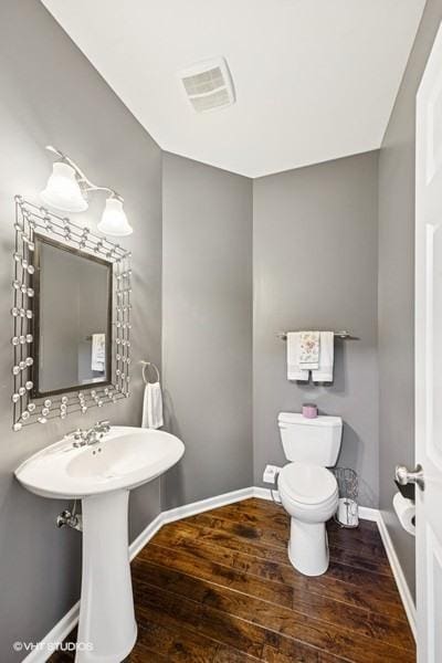 10589 153rd Pl, Orland Park, IL 60462 - half bathroom featuring hardwood / wood-style flooring