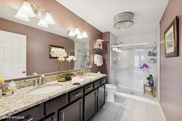 10589 153rd Pl, Orland Park, IL 60462 - bathroom featuring a chandelier, tile patterned floors, double vanity, and a stall shower