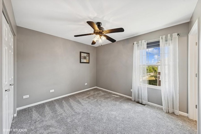 10589 153rd Pl, Orland Park, IL 60462 - carpeted empty room featuring ceiling fan and baseboards