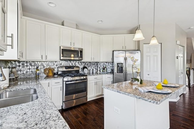 10589 153rd Pl, Orland Park, IL 60462 - kitchen featuring stainless steel appliances, dark wood-style flooring, a kitchen island, white cabinetry, and recessed lighting
