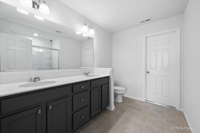 23540 W Bancroft Dr Unit 0, Plainfield, IL 60585 - bathroom featuring double vanity, a tile shower, and tile patterned flooring
