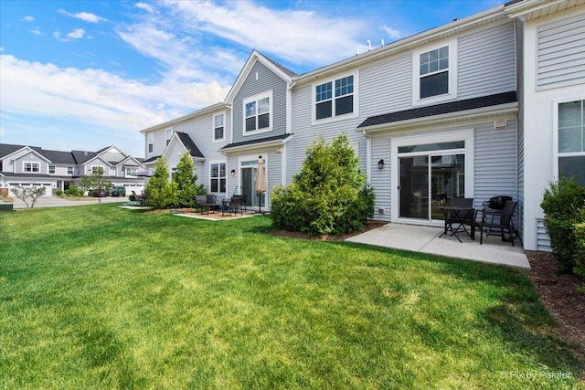 23540 W Bancroft Dr Unit 0, Plainfield, IL 60585 - back of house featuring a patio area, a yard, and a residential view