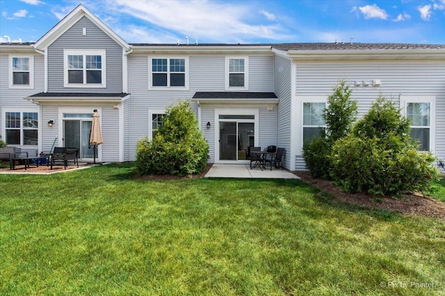 23540 W Bancroft Dr Unit 0, Plainfield, IL 60585 - rear view of property with a patio and a lawn