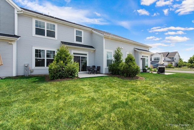 23540 W Bancroft Dr Unit 0, Plainfield, IL 60585 - rear view of house featuring a patio area and a lawn