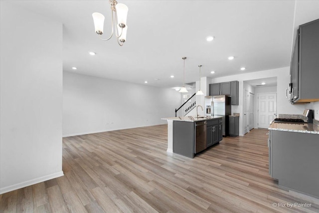 23540 W Bancroft Dr Unit 0, Plainfield, IL 60585 - kitchen with stainless steel appliances, open floor plan, gray cabinetry, light wood-type flooring, and recessed lighting