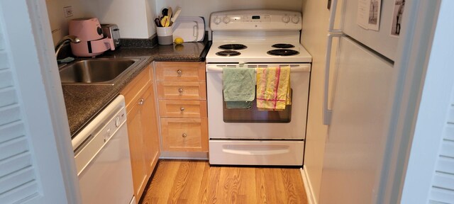 21 W Goethe St Unit 17C, Chicago, IL 60610 - kitchen featuring white appliances and light wood finished floors