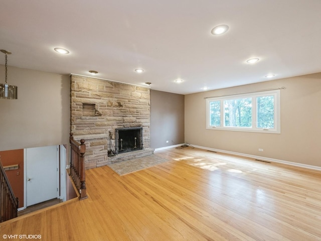 235 S Cedar St, Palatine, IL 60067 - unfurnished living room featuring a fireplace, light wood-style flooring, and recessed lighting