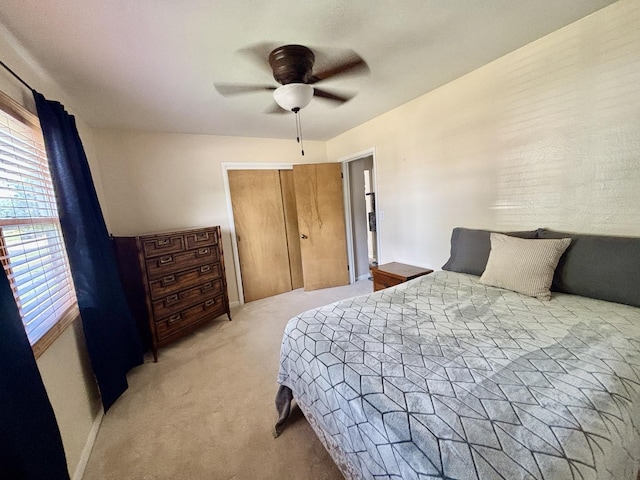 505 Highland St, Belvidere, IL 61008 - bedroom featuring light colored carpet, a closet, and a ceiling fan