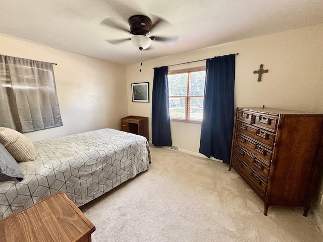 505 Highland St, Belvidere, IL 61008 - bedroom with light colored carpet and a ceiling fan