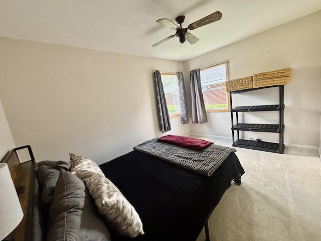 505 Highland St, Belvidere, IL 61008 - carpeted bedroom with baseboards and ceiling fan
