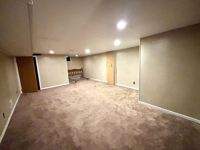505 Highland St, Belvidere, IL 61008 - finished below grade area featuring recessed lighting and carpet floors