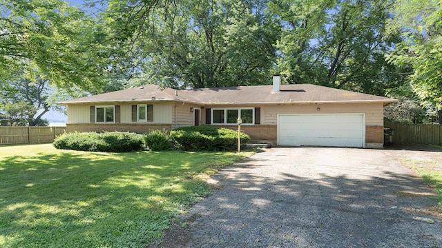 4209 Rotary Rd, Rockford, IL 61109 - ranch-style home featuring brick siding, driveway, a garage, and a chimney