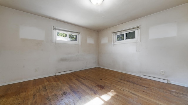 4209 Rotary Rd, Rockford, IL 61109 - empty room featuring a baseboard radiator and hardwood / wood-style floors