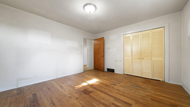 4209 Rotary Rd, Rockford, IL 61109 - unfurnished bedroom with hardwood / wood-style floors and a closet