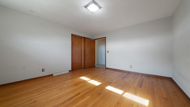 4209 Rotary Rd, Rockford, IL 61109 - unfurnished bedroom featuring light wood-style floors and a closet