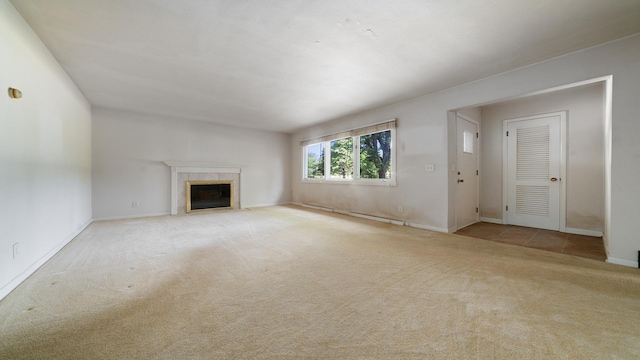 4209 Rotary Rd, Rockford, IL 61109 - unfurnished living room with carpet floors, a baseboard radiator, and a fireplace