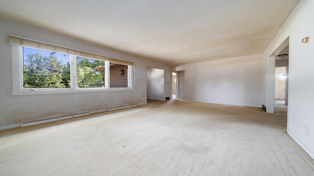 4209 Rotary Rd, Rockford, IL 61109 - carpeted spare room with a baseboard heating unit and baseboards