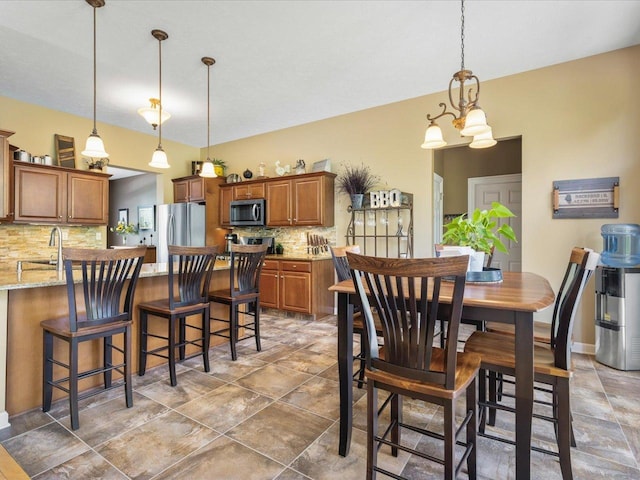 7681 Highlands Dr, Rockford, IL 61102 - dining space featuring light stone finish floors