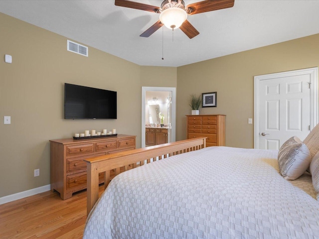 7681 Highlands Dr, Rockford, IL 61102 - bedroom featuring light wood-style flooring, ceiling fan, and ensuite bathroom