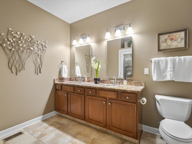 7681 Highlands Dr, Rockford, IL 61102 - full bath with double vanity and tile patterned floors