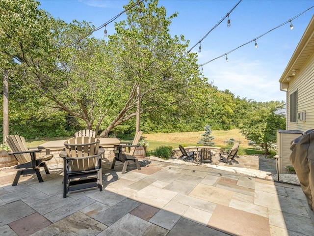 7681 Highlands Dr, Rockford, IL 61102 - view of patio / terrace with an outdoor fire pit, outdoor dining area, and cooling unit