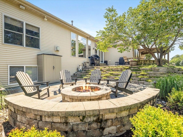 7681 Highlands Dr, Rockford, IL 61102 - view of patio with a fire pit