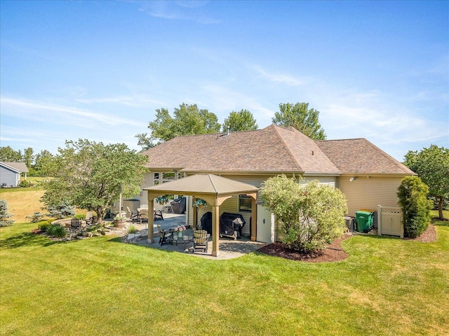 7681 Highlands Dr, Rockford, IL 61102 - rear view of property featuring a gazebo, a patio area, and a yard