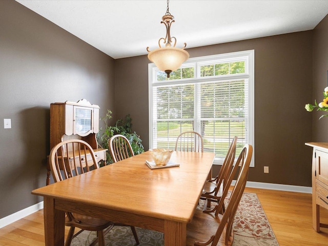 7681 Highlands Dr, Rockford, IL 61102 - dining area with light wood-style flooring