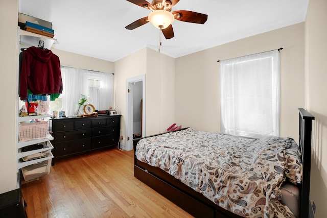 9146 S Hamilton Ave, Chicago, IL 60643 - bedroom with light wood finished floors and ceiling fan