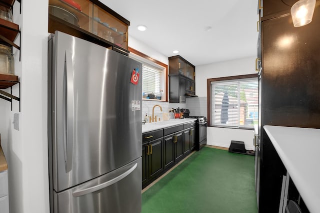 9146 S Hamilton Ave, Chicago, IL 60643 - kitchen with freestanding refrigerator, gas stove, light countertops, backsplash, and recessed lighting