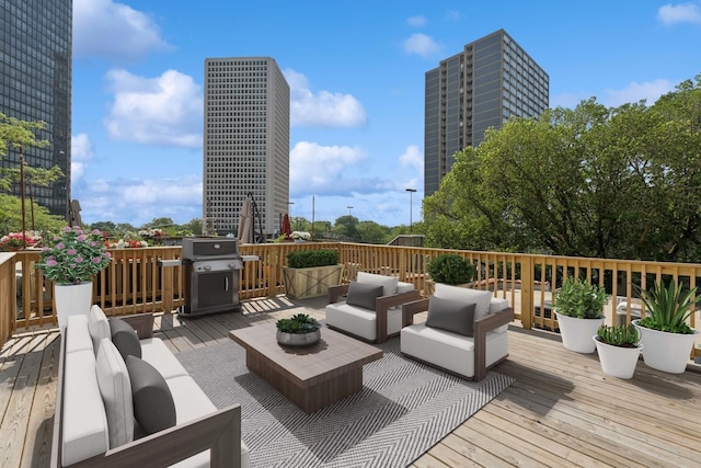 1023 W Balmoral Ave Unit 3A, Chicago, IL 60640 - wooden deck with an outdoor living space and a grill