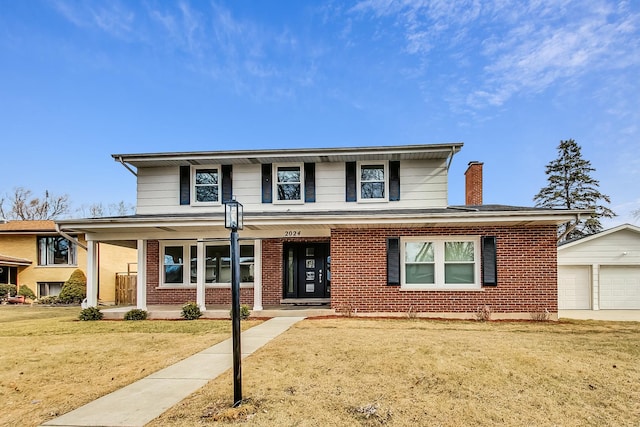 2024 E Wintergreen Ave, Mount Prospect, IL 60056 - traditional-style house with a porch, brick siding, a chimney, and a front yard