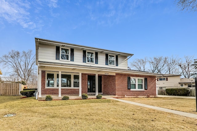 2024 E Wintergreen Ave, Mount Prospect, IL 60056 - traditional-style house featuring brick siding and covered porch
