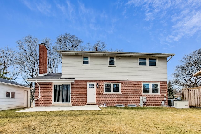 2024 E Wintergreen Ave, Mount Prospect, IL 60056 - rear view of property with brick siding, a patio, and a chimney