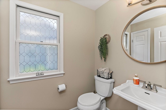 105 Devonshire Dr, Dekalb, IL 60115 - half bathroom featuring toilet and a sink