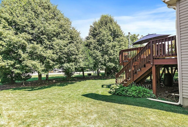 105 Devonshire Dr, Dekalb, IL 60115 - view of grassy yard with stairway and a deck
