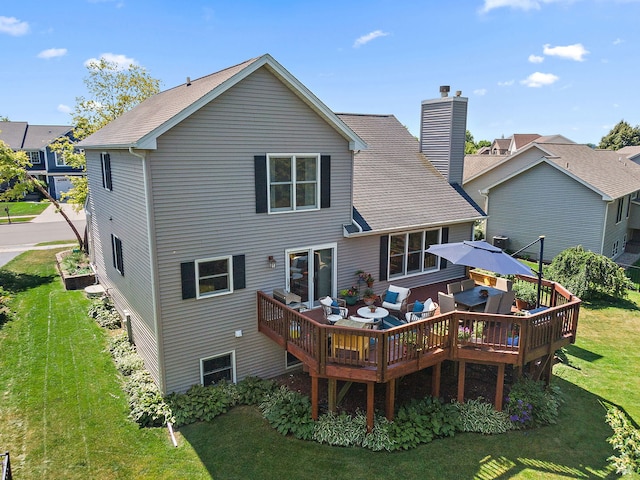 105 Devonshire Dr, Dekalb, IL 60115 - back of property with a wooden deck, a lawn, a chimney, and a shingled roof