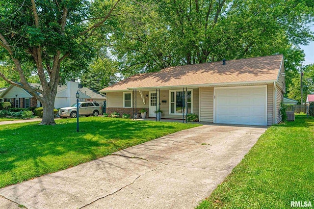 145 White Ave, Lincoln, IL 62656 - ranch-style house with an attached garage, concrete driveway, a porch, and brick siding