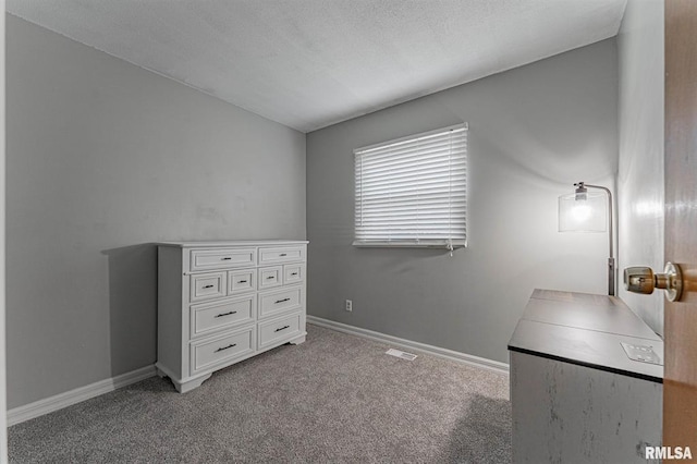 145 White Ave, Lincoln, IL 62656 - unfurnished bedroom with carpet flooring and baseboards